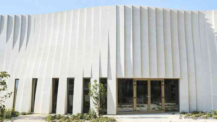 Rippling robot-carved stone facade defines winery by Carl Fredrik Svenstedt Architect