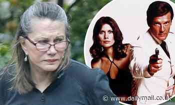 Bond girl Maud Adams, 75, still has a spring in her step as she is seen walking her dog