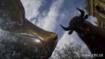 Jittery stock markets inch cautiously higher Friday amid coronavirus volatility