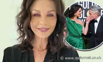 Catherine Zeta-Jones reveals husband Michael Douglas is teaching her how to play pool while at home