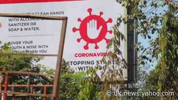 Street art and billboards promote precautionary measures against COVID-19