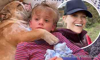 Reese Witherspoon shares adorable photo of son Tennessee and dog bonding during COVID-19 isolation