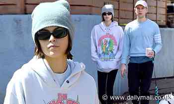 Kaia Gerber and Tommy Dorfman continue to isolate together while taking the dog on a walk