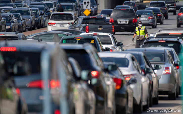 Amid coronavirus fears, food bank pop-up at Honda Center draws long lines of cars