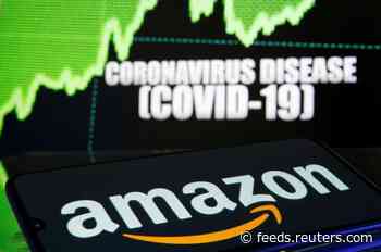 Amazon raises overtime pay for warehouse workers