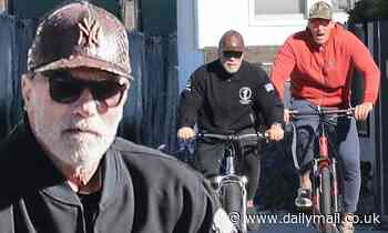Arnold Schwarzenegger, 72, enjoys a bike ride with a pal as he takes a break from self-quarantining
