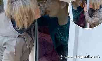 Ruth Langsford kisses her mum Joan through a window as she wishes her a Happy Mother's Day