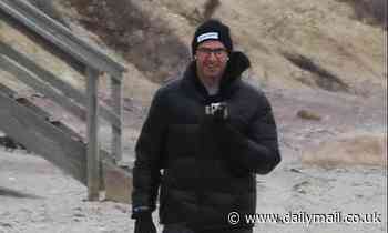 Hugh Jackman takes his dog for a walk in the Hamptons following New York's coronavirus lockdown
