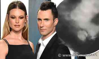 Behati Prinsloo reveals she is NOT pregnant after her daughter accidentally posts a photo