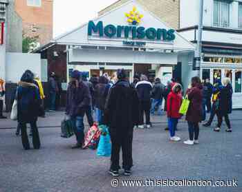 Pictures show scenes outside Sutton supermarkets hours before new restrictions put in place