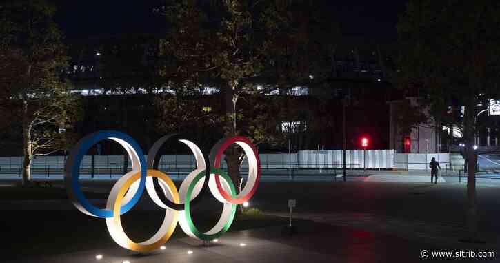 A virus rages, a flame goes out: Tokyo Games reset for 2021
