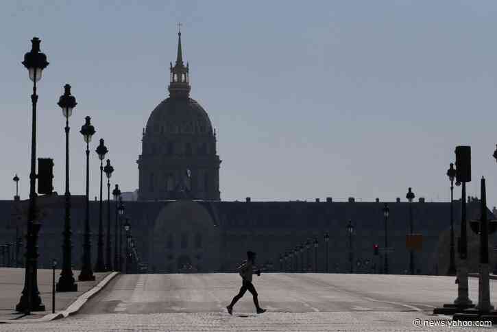 With church bells and candles, France honors virus victims