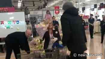 Coronavirus: Tesco employees applaud NHS workers in Belfast - Sky News