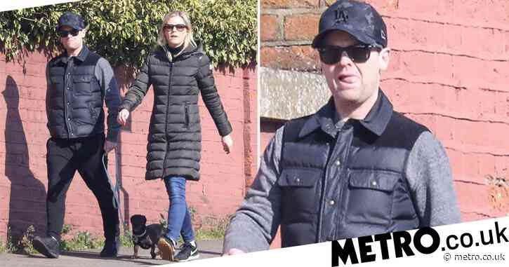 Declan Donnelly and wife Ali Astall take break from self-isolation to get their daily exercise by walking the dog