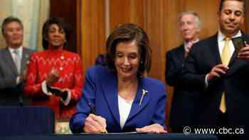 U.S. states, hospitals plead for help as Trump approves coronavirus aid bill