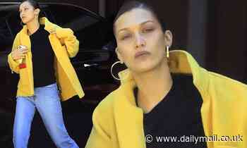 Bella Hadid stands out in bright yellow jacket with jeans while stepping out to pick up food in LA