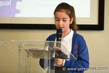 Hempland schoolgirls receive prizes for their creative work at NRM