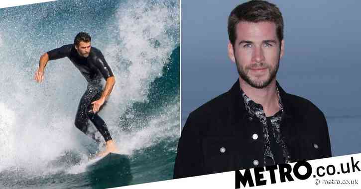 Liam Hemsworth is a surfing pro as he takes his mind off coronavirus social-distancing rules