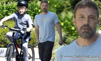 Ben Affleck greets his bicycle-riding son Samuel outside his house amid COVID-19 self-isolation