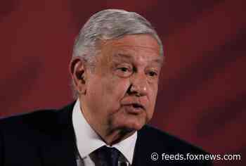 Mexico's López Obrador shakes hands with mother of 'El Chapo' despite coronavirus warnings, video shows