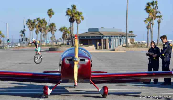 Plane lands at Huntington State Beach parking lot, pilot wasn’t injured