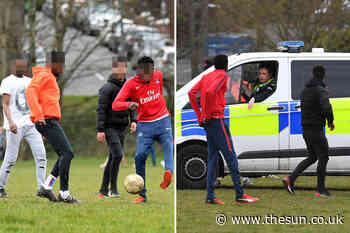 Police break up football match in the park as Brits flout coronavirus lockdown rules - The Sun