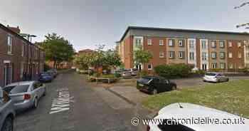 Man arrested after woman falls from balcony at Gosforth flat