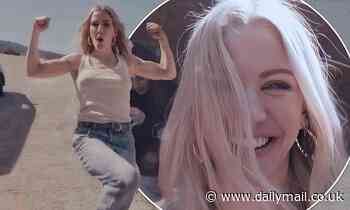Ellie Goulding larks around on set in behind-the-scenes snaps from Worry About Me music video