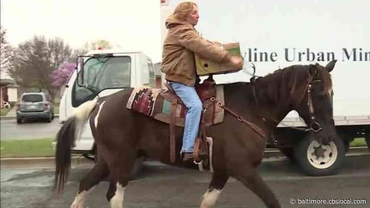 Volunteers On Horseback Deliver Groceries To Seniors Confined By Coronavirus Pandemic