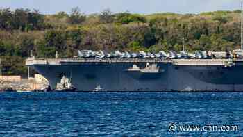 Virus-hit aircraft carrier gets relief after commander's extraordinary plea