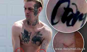 Aaron Carter appears to be scratched and bruised while out after ex's domestic violence arrest