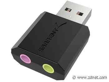 How do I connect a microphone to my MacBook?