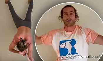 Jake Gyllenhaal shows off toned quarantine physique as he puts on his shirt while doing a handstand 