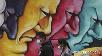 In Ecuador, families wait with their dead as bodies pile up