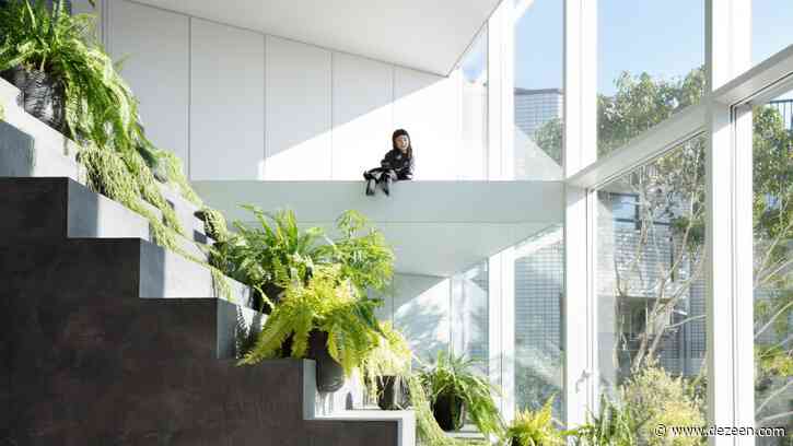 Steel and concrete steps cut through facade of Stairway House by Nendo
