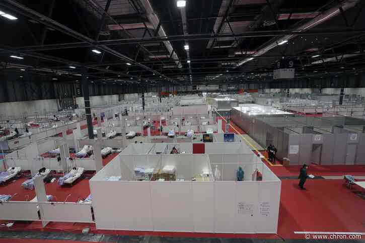 Europe's hospitals buckle under the crush of the coronavirus
