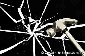 Woman smashed neighbour's window with hammer - The Bolton News
