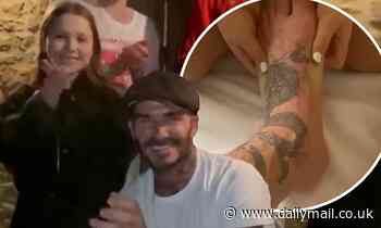 David Beckham enjoys a relaxing night in with a rose petal bath run by Harper