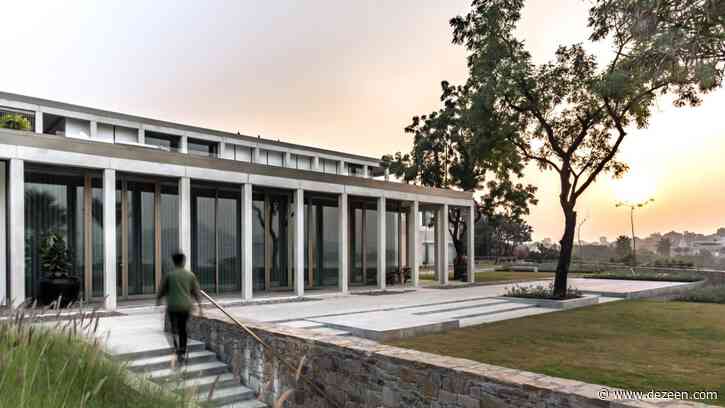White concrete house by Matra Architects perches above lake in Udaipur