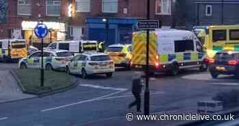 Man taken to hospital after huge police presence descends on Walker street