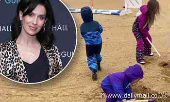 Hilaria Baldwin shows her kids enjoying time on a farm digging holes while out of NYC