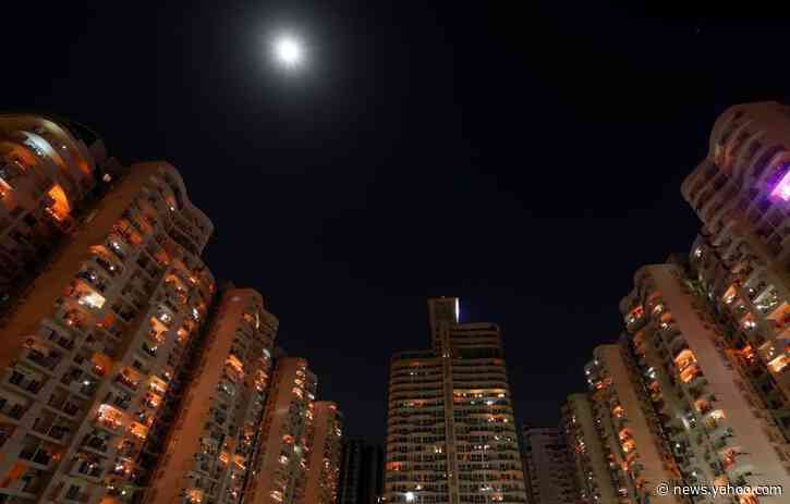 Indians light lamps to heed Modi's call for coronavirus comradeship