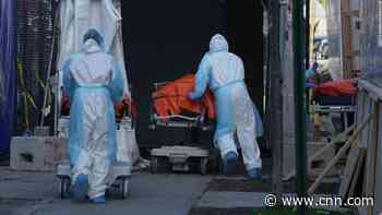 US death toll passes 10,000 as officials warn of most challenging week yet