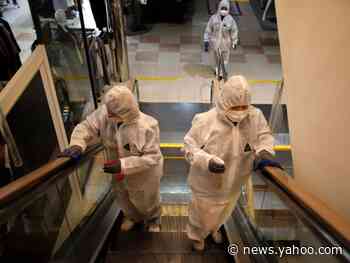 The coronavirus can live on a surgical mask for 7 days, cloth for 2 days, and paper for 3 hours. Here's how to disinfect surfaces properly.