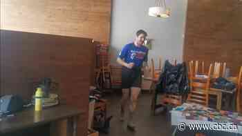 For more than 24 hours, long-distance racer ran laps inside Alberta town's coffee shop