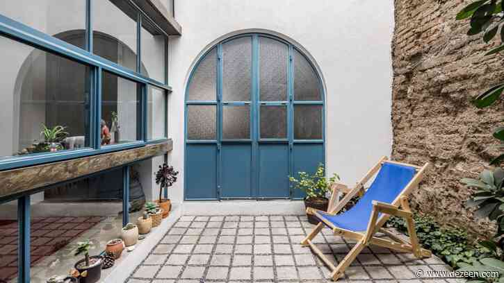 Arched terracotta volume tops Delfino Lozano's Guadalajara apartment complex