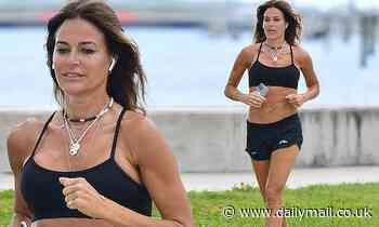 Kelly Bensimon, 51, looks youthful in a bra top and shorts as she jogs in Florida