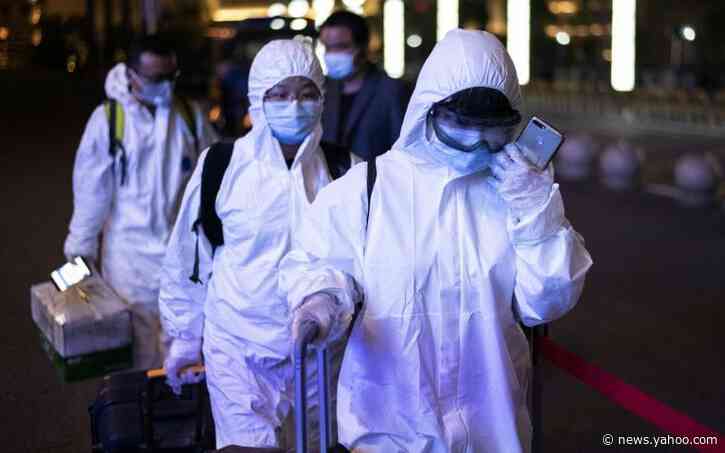 Exodus begins as virus-hit Wuhan lifts ban on outbound travel