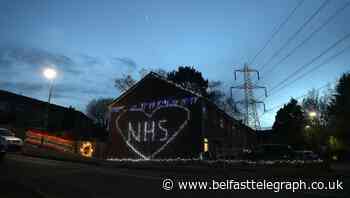Family uses Christmas lights to decorate their house in tribute to NHS