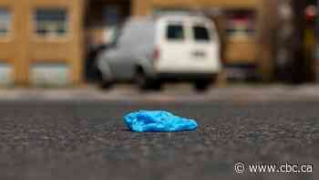 Gloves, face masks discarded outside grocery stores a problem, City of Edmonton says